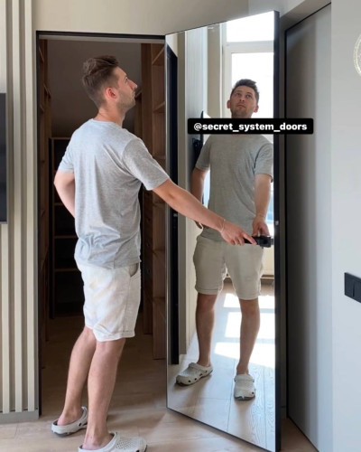 Двері прихованого монтажу із алюмінієвим торцем чорного кольору